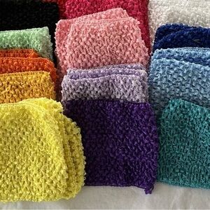Stretch Headbands. 28 in the lot. Colors shown are in the lot. 5x5.5 inches.